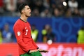 サッカー欧州選手権準々決勝、ポルトガル対フランス。PK戦でシュートを決めて喜ぶポルトガルのクリスティアーノ・ロナウド（2024年7月5日撮影）。(c)PATRICIA DE MELO MOREIRA / AFP