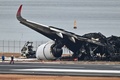 海上保安庁の航空機と衝突した日本航空（JAL）の旅客機。東京国際（羽田）空港で（2024年1月3日撮影）。(c)Richard A. Brooks / AFP