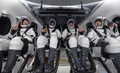米宇宙開発企業スペースXの有人宇宙船クルードラゴンで地球に帰還した（左から）シャノン・ウォーカーさん、ビクター・グローバーさん、マイケル・ホプキンスさん、野口聡一さん。回収されたクルードラゴン船内で。米航空宇宙局（NASA）提供（2021年5月2日公開）。(c)AFP PHOTO /NASA/Bill INGALLS