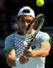 テニス、ドバイ・テニス選手権、男子シングルス2回戦。リターンを狙うジョアン・ソウザ（2015年2月25日撮影）。(c)AFP/MARWAN NAAMANI