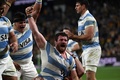 ラグビー南半球4か国対抗戦、ザ・ラグビーチャンピオンシップ第2節、オーストラリア対アルゼンチン。トライを喜ぶアルゼンチンのフリアン・モントーヤ（中央、2023年7月15日撮影）。(c)Saeed KHAN / AFP