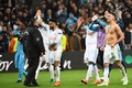 サッカーヨーロッパリーグ準々決勝第2戦、オリンピック・マルセイユ対RBライプツィヒ。勝利を喜ぶオリンピック・マルセイユの選手（2018年4月12日撮影）。(c)AFP PHOTO / BORIS HORVAT