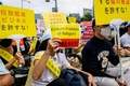 韓国・ソウルで抗議活動を行う世界平和統一家庭連合（旧統一教会）の信者ら（2022年8月18日撮影）。(c)Anthony WALLACE / AFP