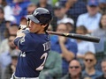 18MLB、ナ・リーグ中地区優勝決定戦、シカゴ・カブス対ミルウォーキー・ブルワーズ。3回に適時打を放つミルウォーキー・ブルワーズのクリスチアン・イエリチ（2018年10月1日撮影）。(c)Jonathan Daniel/Getty Images/AFP