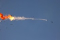イスラエル北部上空でイスラエル空軍によって迎撃されたヒズボラの無人航空機。イスラエル北部で撮影（2024年8月25日撮影）。(c)Jalaa MAREY / AFP