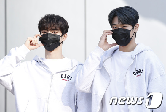 (左）キュー、(右）ジュヨン　(c)news1