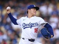 24MLB、ロサンゼルス・ドジャース対コロラド・ロッキーズ。先発登板するロサンゼルス・ドジャースの山本由伸（2024年6月1日撮影）。(c)Harry How/Getty Images/AFP