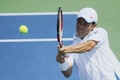 テニス、全米オープン（The US Open Tennis Championships 2014）男子シングルス1回戦。リターンを打つ錦織圭（Kei Nishikori、2014年8月26日撮影）。(c)AFP/Kena Betancur