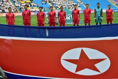 アジア大会を取材する北朝鮮記者団、ネット使えずFAXを駆使