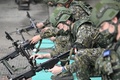 台湾・桃園の基地で軍事訓練に臨む台湾の予備役兵士（2022年3月12日撮影、資料写真）。(c)Sam Yeh / AFP