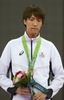 第17回アジア競技大会（17th Asian Games、Asiad）、テコンドー男子58キロ級。銅メダルを獲得し、表彰式に臨む山田勇磨（Yuma Yamada、2014年10月3日撮影）。(c)AFP/PORNCHAI KITTIWONGSAKUL