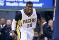 13-14NBAプレーオフ・イースタンカンファレンス準決勝（7回戦制）、インディアナ・ペイサーズ（Indiana Pacers）対ワシントン・ウィザーズ（Washington Wizards）第2戦。得点を入れて喜ぶインディアナ・ペイサーズのイアン・マイミ（Ian Mahinmi、2014年5月7日撮影）。(c)AFP/Getty Images/Andy Lyons