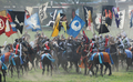 福島県の伝統祭り「相馬野馬追」は29日に2日目を迎え、東日本大震災の影響で前年は見送られていた主行事の甲冑（かっちゅう）競馬と神旗争奪戦が南相馬市で行われた。1000年にわたり続く祭りにはこの日、数万人が訪れ、約400騎が繰り広げる勇壮な伝統行事を楽しんだ。

写真は神旗争奪戦で、中央にある黄色い旗を奪い合う騎馬武者たち（2012年7月29日撮影）。(c)AFP/Toru YAMANAKA