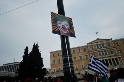 メルケル独首相がギリシャ訪問、アテネなどでデモ