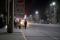 北朝鮮の首都・平壌（Pyongyang）市、平壌地下鉄の復興（Puhung）駅の外を歩く人々。平壌地下鉄は故金日成（キム・イルソン、Kim Il-Sung）体制下の1969～1972年に開通。地下110メートル付近を走り、世界で最も地中深くにある地下鉄とされる。15日は、故金日成主席の生誕100年にあたる（2012年4月14日撮影）。(c)AFP/Ed Jones
