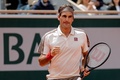 全仏オープンテニス、男子シングルス準決勝。ポイントを奪いガッツポーズをするロジャー・フェデラー（2019年6月7日撮影）。(c)Thomas SAMSON / AFP