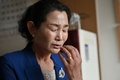 韓国・ソウルでAFPのインタビューに応じるイ・スンクムさん（2020年7月22日撮影）。(c)Jung Yeon-je / AFP