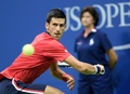 全米オープンテニス、男子シングルス2回戦。リターンを狙うノバク・ジョコビッチ（2015年9月2日撮影）。(c)AFP/DON EMMERT