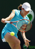 バックハンドで応戦するジュスティーヌ・エナン。(c)AFP/Getty Images/Clive Brunskill