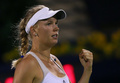 ドバイ・テニス選手権（Dubai Duty Free Tennis Championships 2013）は21日、女子シングルス準々決勝が行われ、大会第8シードのカロリーネ・ボズニアツキ（Caroline Wozniacki、デンマーク）は4-6、6-1、6-4でフランスのマリオン・バルトリ（Marion Bartoli）を下し準決勝に進出した。

ポイントを奪いガッツポーズを見せるカロリーネ・ボズニアツキ（2013年2月21日撮影）。(c)AFP/MARWAN NAAMANI