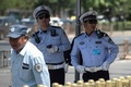 中国・北京の天安門広場で警備に当たる警官ら（2018年6月4日撮影）。(c) AFP PHOTO / FRED DUFOUR