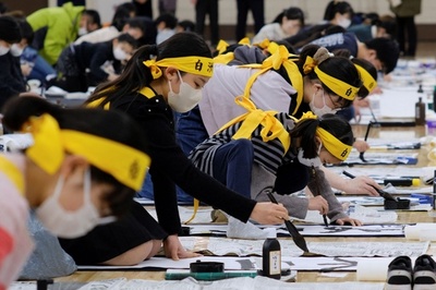 【今日の1枚】鉢巻き締めて真剣勝負