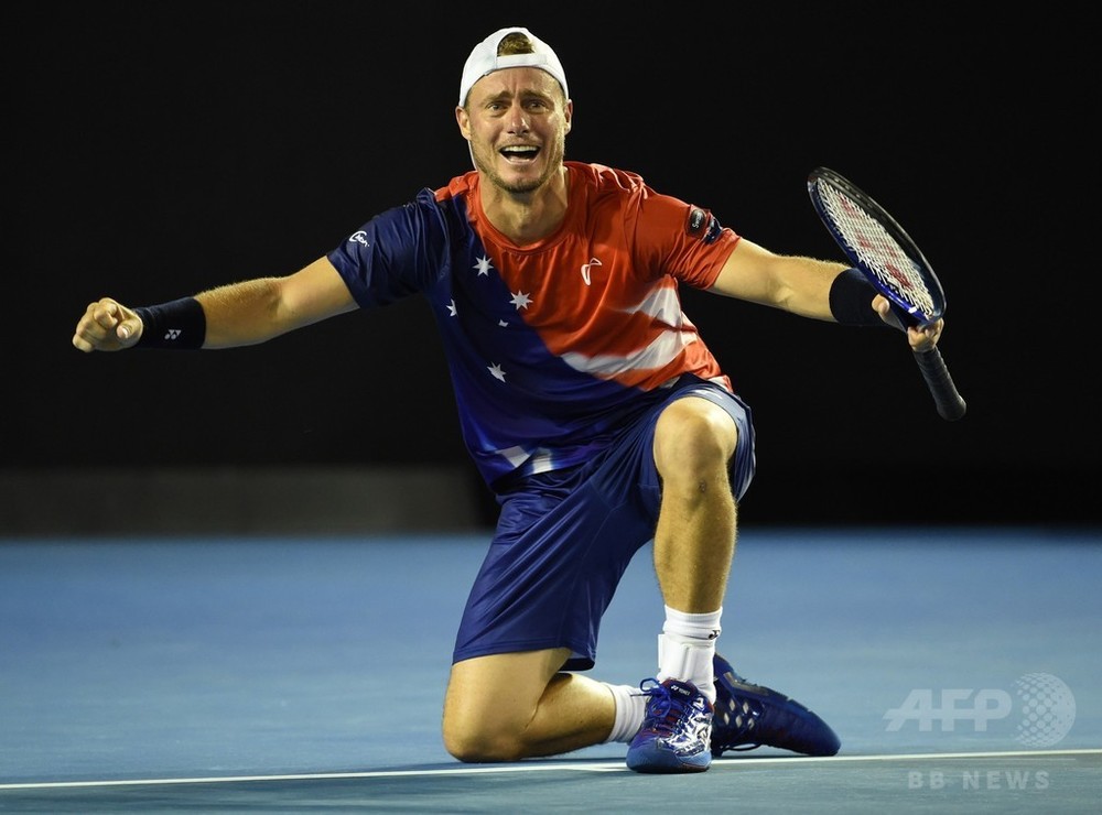 ヒューイット、最後の全豪オープンで初戦突破 写真8枚 国際ニュース