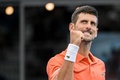 テニス、アデレード国際1、男子シングルス2回戦。勝利を喜ぶノバク・ジョコビッチ（2023年1月5日撮影）。(c)Brenton EDWARDS / AFP
