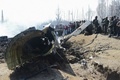 インド北部ジャム・カシミール州バッジャンに墜落したインド空軍機の残骸（2019年2月27日撮影）。(c)Tauseef MUSTAFA / AFP