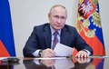 ロシア・モスクワ郊外ノボオガリョボの大統領公邸で、政府関係者とビデオ会議に臨むウラジーミル・プーチン大統領。スプートニク提供（2021年12月24日撮影）。(c)Alexey NIKOLSKY / Sputnik / AFP