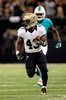 13NLF第4週、ニューオーリンズ・セインツ（New Orleans Saints）対マイアミ・ドルフィンズ（Miami Dolphins）。ボールを運ぶニューオーリンズ・セインツのダレン・スプロールズ（Darren Sproles、2013年9月30日撮影）。(c)AFP/Getty Images/Stacy Revere