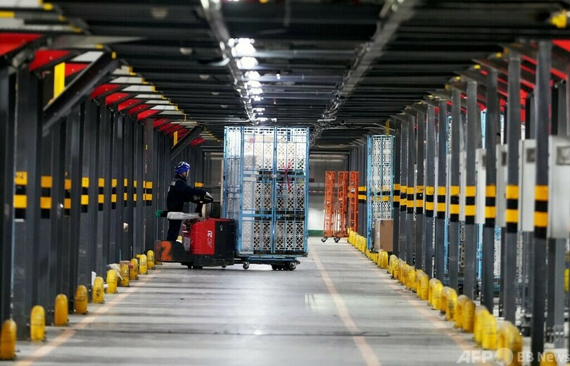 中国の宅配便、初の1800億件　自動化が加速