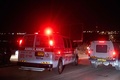 イスラエル北部ハイファ近郊で、無人機攻撃を受けた現場に到着した救急車（2024年10月13日撮影）。(c)Oren ZIV / AFP
