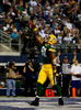 13NFL第15週、ダラス・カウボーイズ（Dallas Cowboys）対グリーンベイ・パッカーズ（Green Bay Packers）。タッチダウンを決め喜ぶグリーンベイ・パッカーズのアンドリュー・クオールス（Andrew Quarless、2013年12月15日撮影）。(c)AFP/Getty Images/Tom Pennington