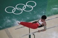 リオデジャネイロ五輪、体操男子個人総合決勝。平行棒の演技に臨む内村航平（2016年8月10日撮影）。(c)AFP/Antonin THUILLIER