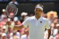  テニス、ウィンブルドン選手権、男子シングルス1回戦。勝利を喜ぶロジャー・フェデラー（2018年7月2日撮影）。(c)AFP PHOTO / Glyn KIRK