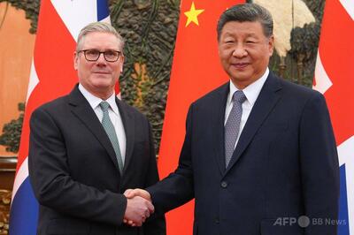 習主席、対話と協力強化を強調 英首相と北京で会談