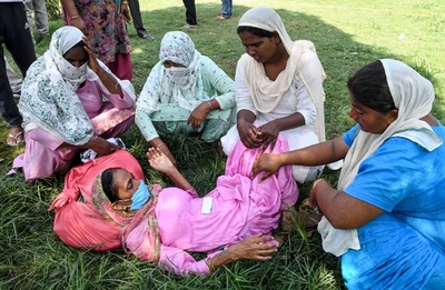 インドの密造酒による死者、98人に