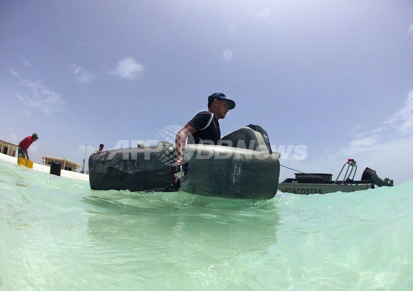観光はしばらくお休み、ベネズエラの島で清掃作業