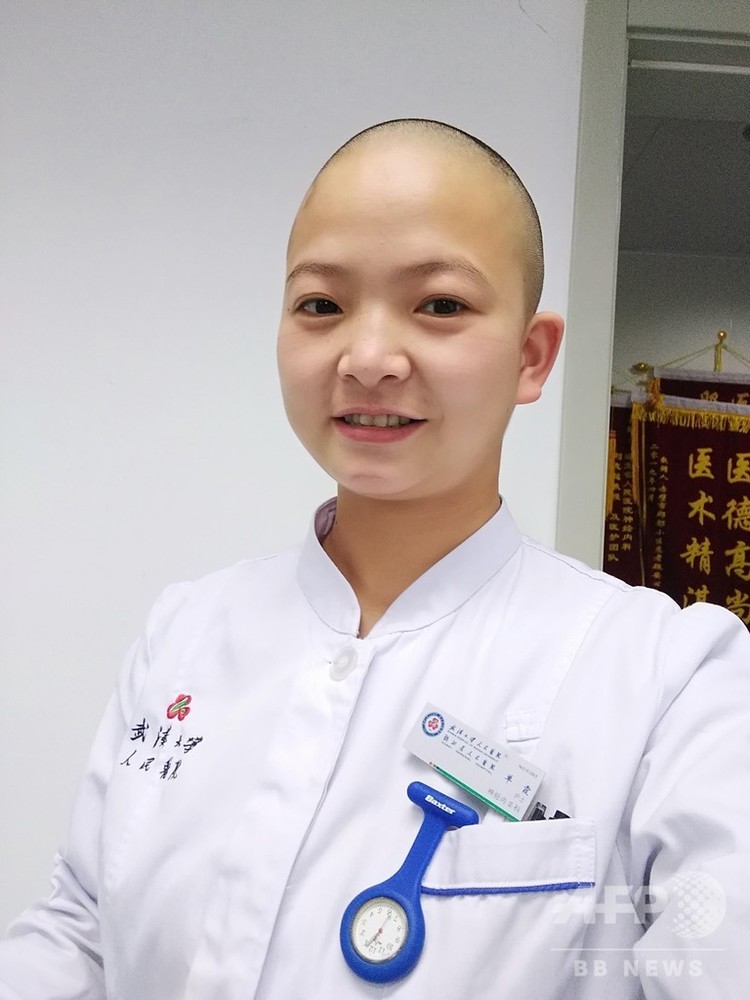 自身も患者も新型肺炎から守る 丸刈りの女性看護師 中国 武漢 写真2枚 国際ニュース Afpbb News