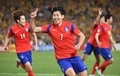 第16回アジアカップ決勝、韓国対オーストラリア。同点ゴールを決め歓喜する韓国の孫興民（2015年1月31日撮影）。(c)AFP/Peter PARKS