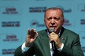 トルコのイズミルで開かれた地方選の選挙集会で演説するレジェプ・タイップ・エルドアン大統領（2019年3月17日撮影）。(c)AFP PHOTO / TURKISH PRESIDENTIAL PRESS OFFICE