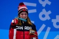 平昌冬季五輪のスピードスケート・ショートトラック女子500メートルで銅メダルを獲得し、メダル授与式に臨むキム・ブタン（2018年2月14日撮影）。(c)AFP PHOTO/Martin BUREAU