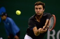 男子テニス、上海マスターズ（2014 Shanghai Rolex Masters）シングルス決勝。リターンを打つジル・シモン（Gilles Simon、2014年10月12日撮影）。(c)AFP/JOHANNES EISELE