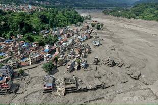 ネパール・チベット洪水、死者165人 1000人以上不明 氷河崩落が原因か
