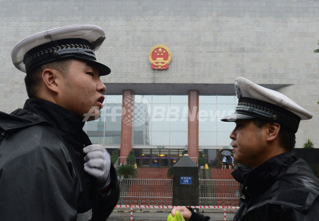 王立軍被告に懲役15年、亡命を図った罪などで 写真2枚 国際ニュース:AFPBB News