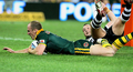 トライを決めるオーストラリアのダレン・ロッカー（%%Darren Lockyer%%）。（2008年11月22日撮影）(c)AFP/Greg WOOD