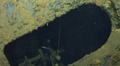 フィリピン沖のシブヤン海の海底に沈む、第2次世界大戦中に撃沈された旧日本海軍の戦艦「武蔵」とみられる船体の一部（動画より抜粋、2015年3月13日提供）。(c)AFP/Paul G. Allen