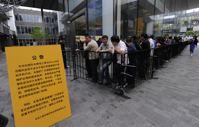 中国のアップル店舗で「iPad2」に客が殺到、負傷者も