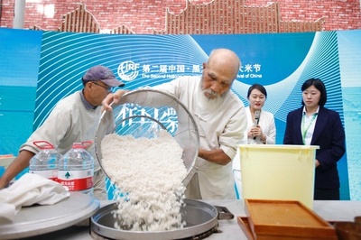 日本の「飯炊き仙人」がハルビン「コメ祭り」に参加、「古来の飯炊き法」を実演